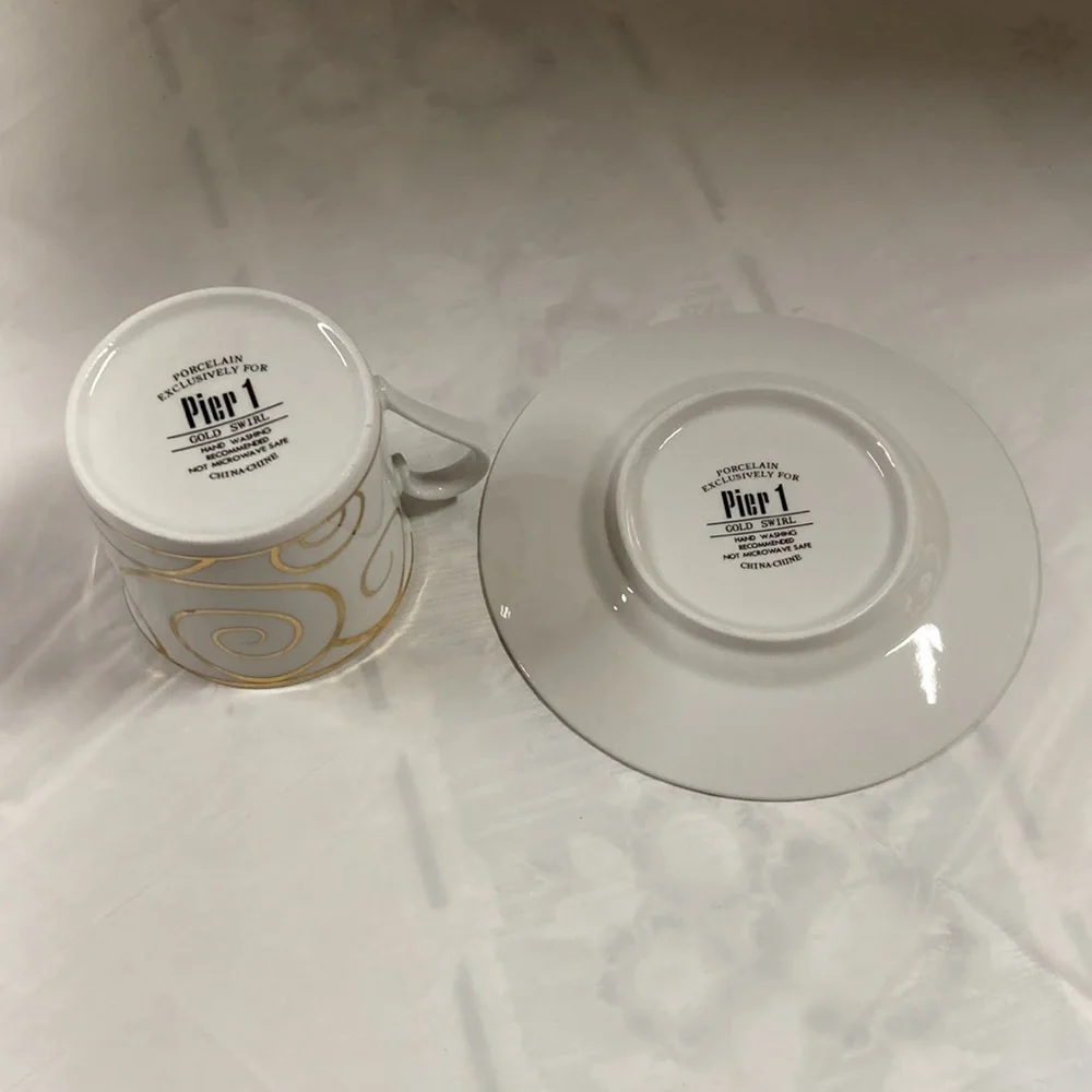 Pier 1 Gold Swirl Porcelain Cup and Saucer Set